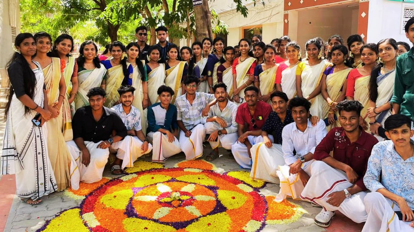 Students Celebrating Onam with Floral Pookalam